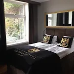 Grand - Unike Отель